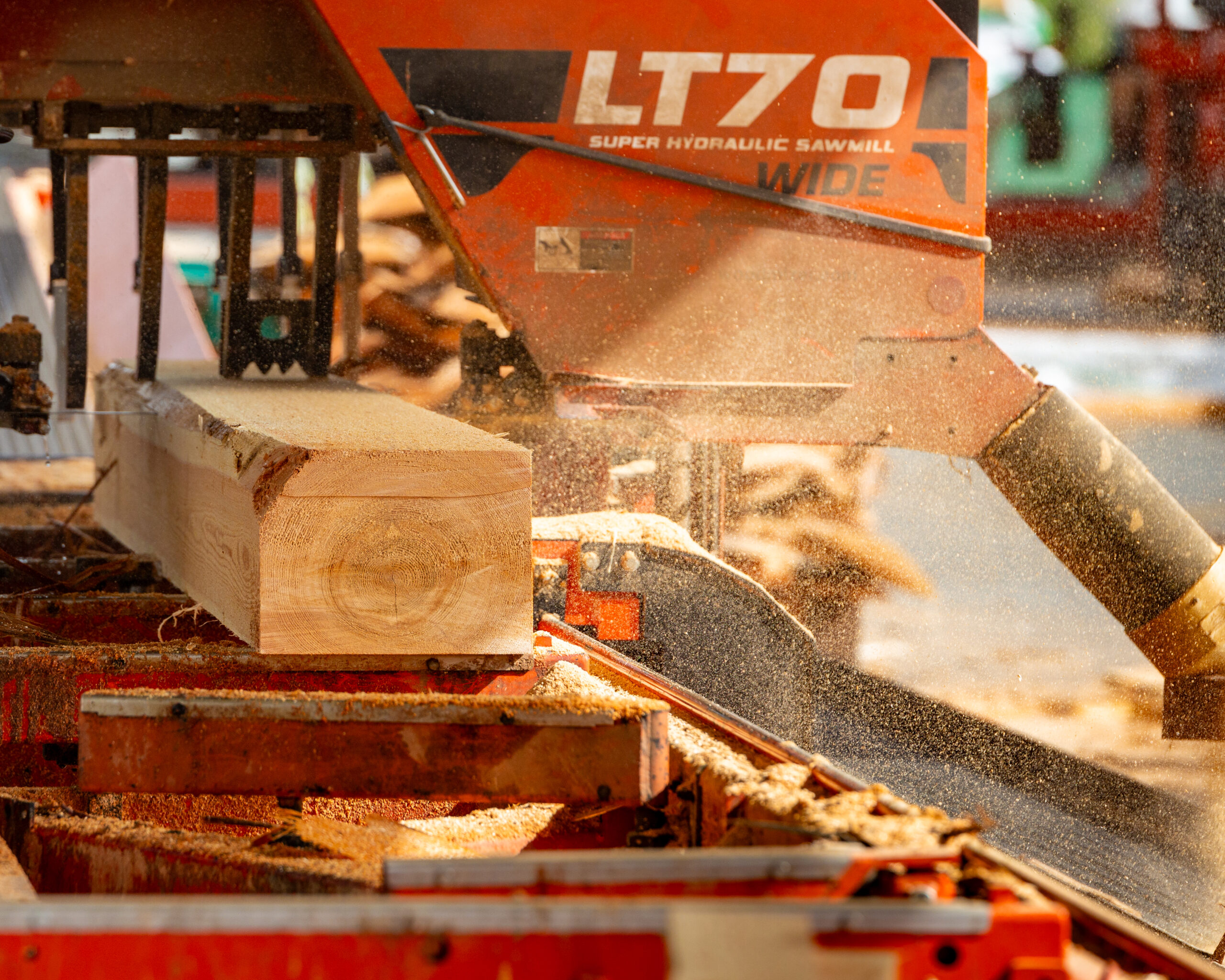 LT70 machine cutting block of wood